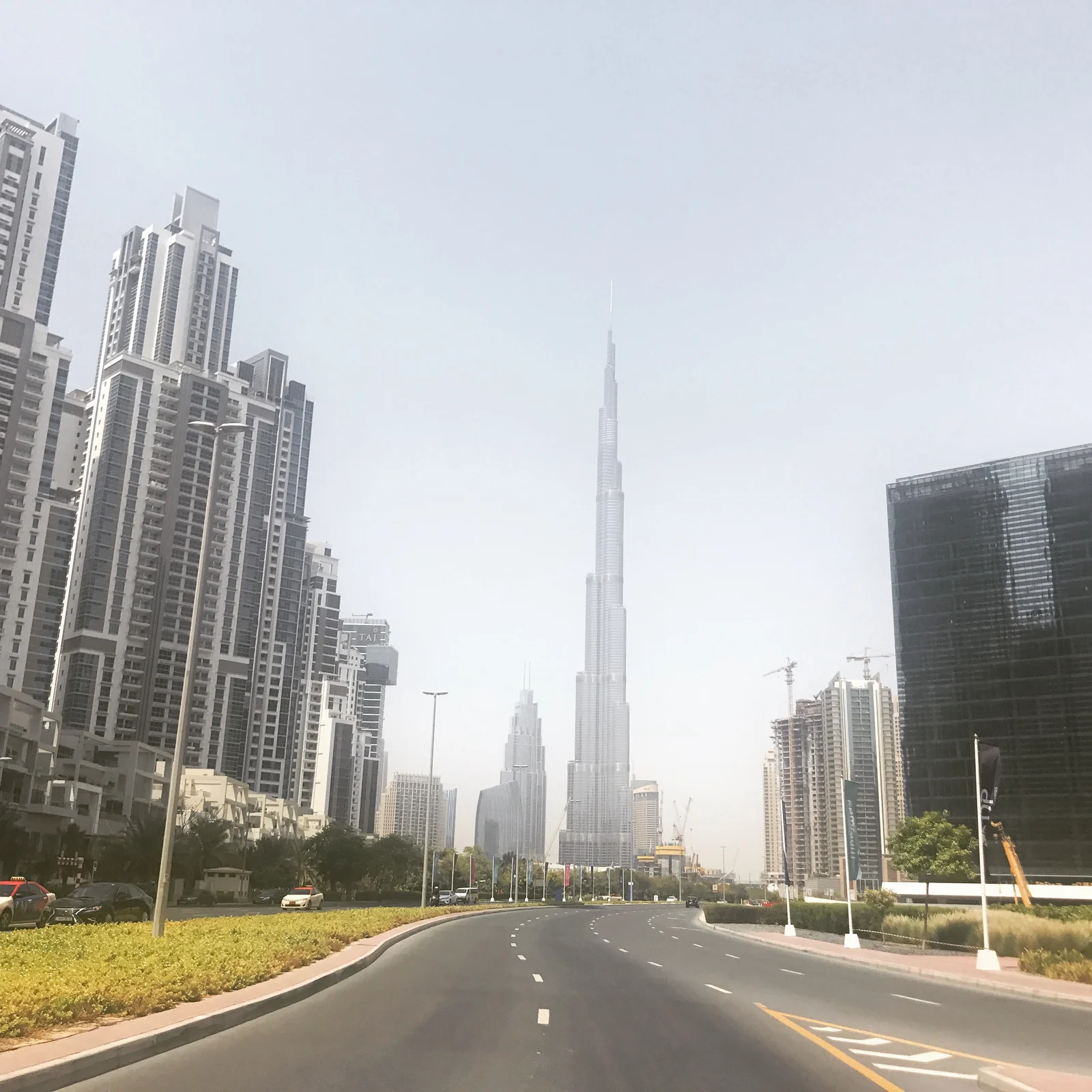 Business Bay towers with Burj Khalifa in the distance