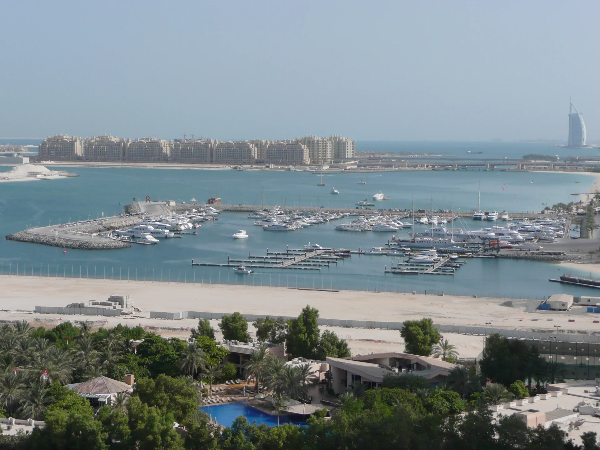View over Dubai Marina harbour towards Palm Jumeirah and the Burj Al Arab