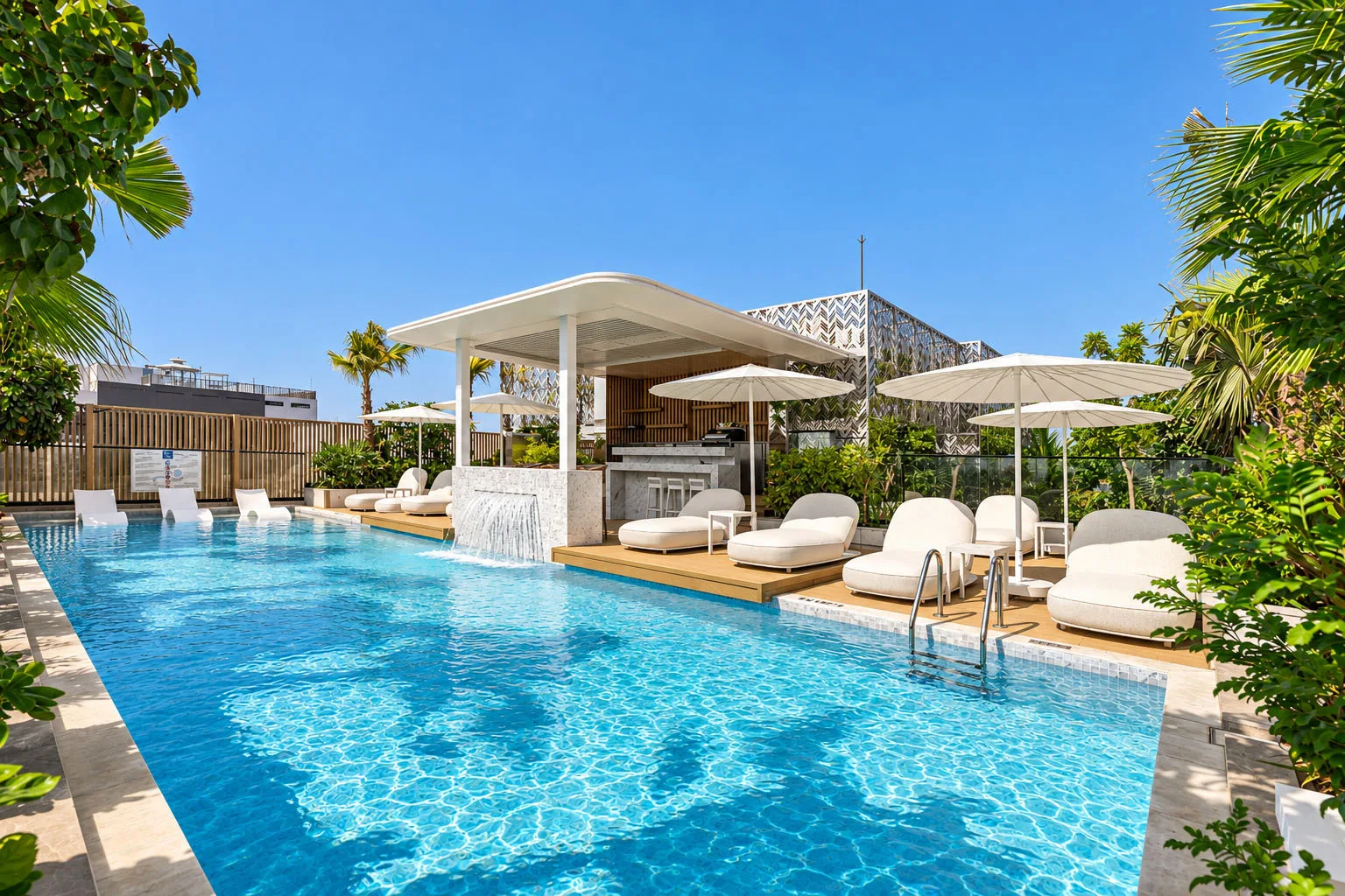 Rooftop swimming pool and cabanas at Elemental 78, Jumeirah Garden City, Dubai