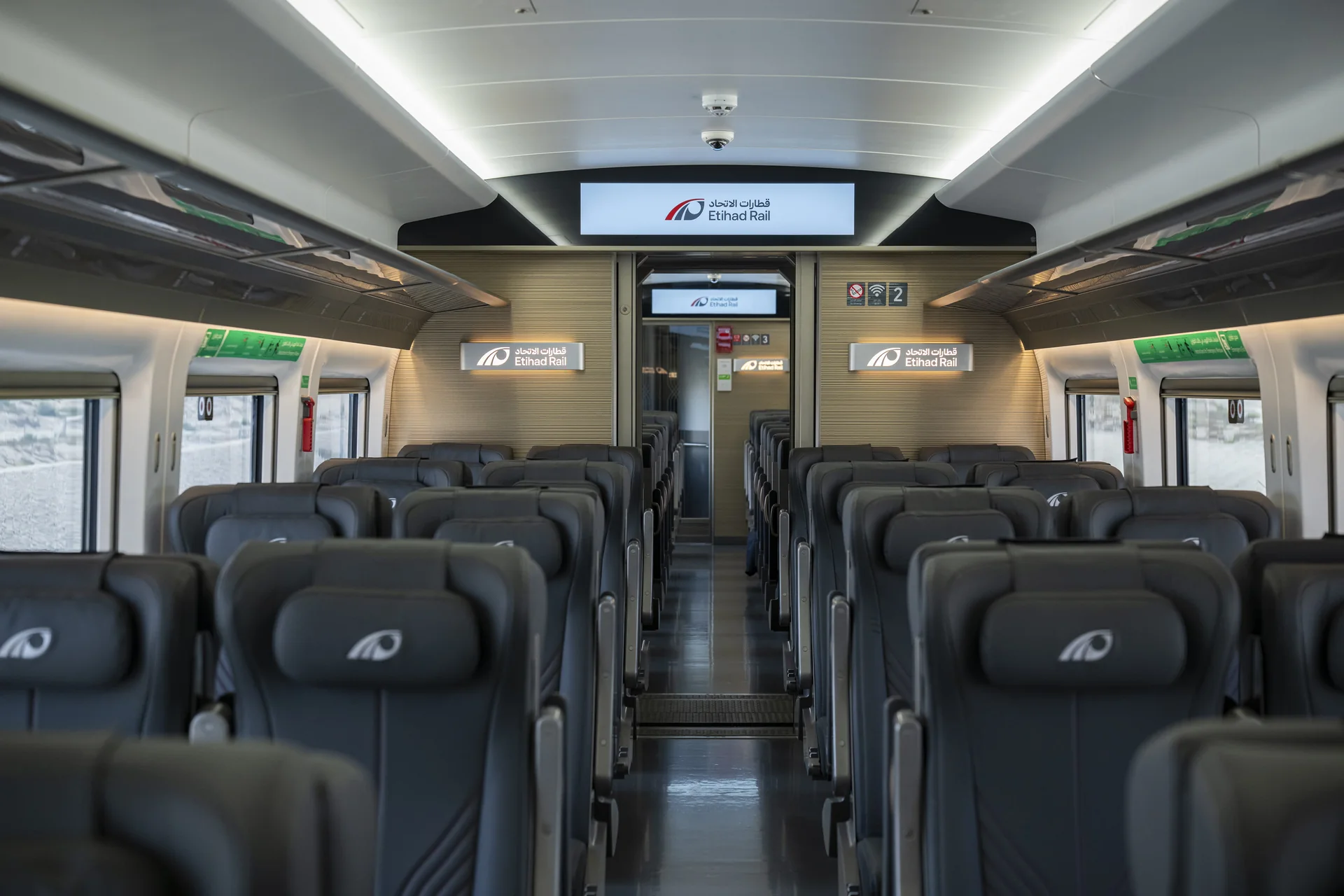 Comfort Class seating inside an Etihad Rail passenger train serving Dubai, Abu Dhabi and Fujairah