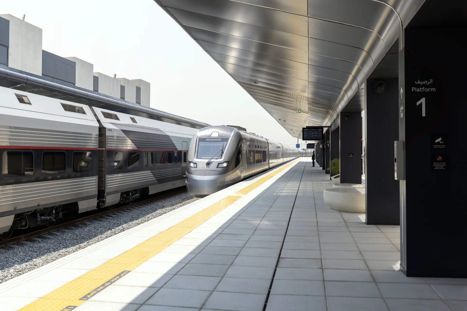 Etihad Rail passenger train at the platform of Dubai Al Yalayis Station in Jumeirah Golf Estates